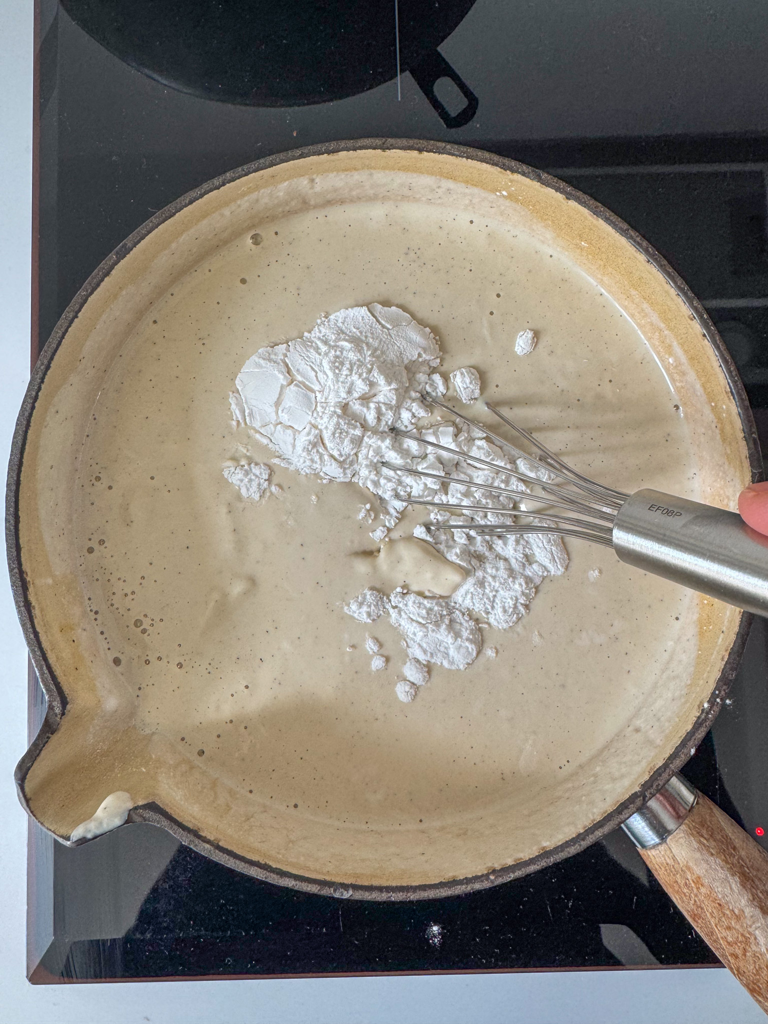 Cashew bechamel sauce on a pot