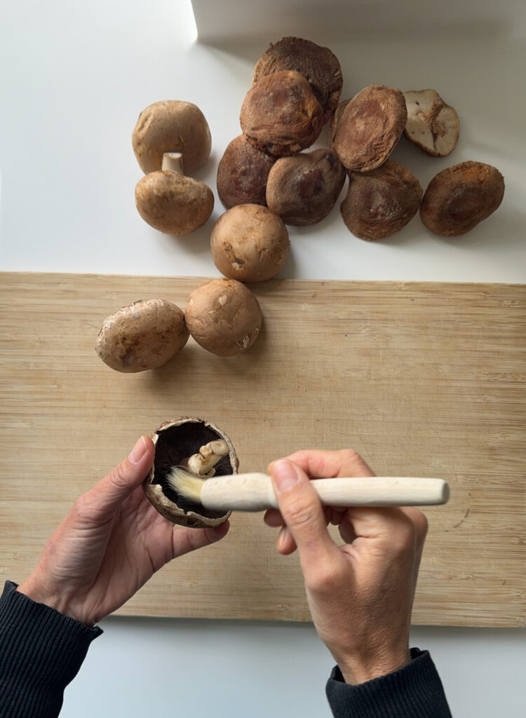 Cleaning Mushrooms with a brush