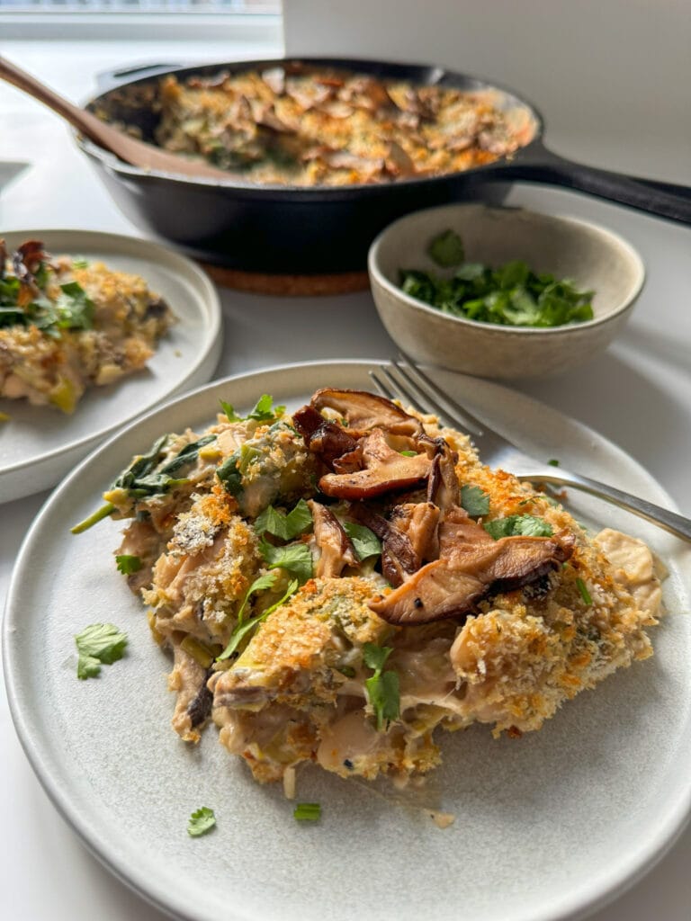 Cheesy Leek and Butter Bean Gratin being served in a small plate