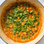 Creamy Vegan Chickpea Curry topped with Cilantro leaves
