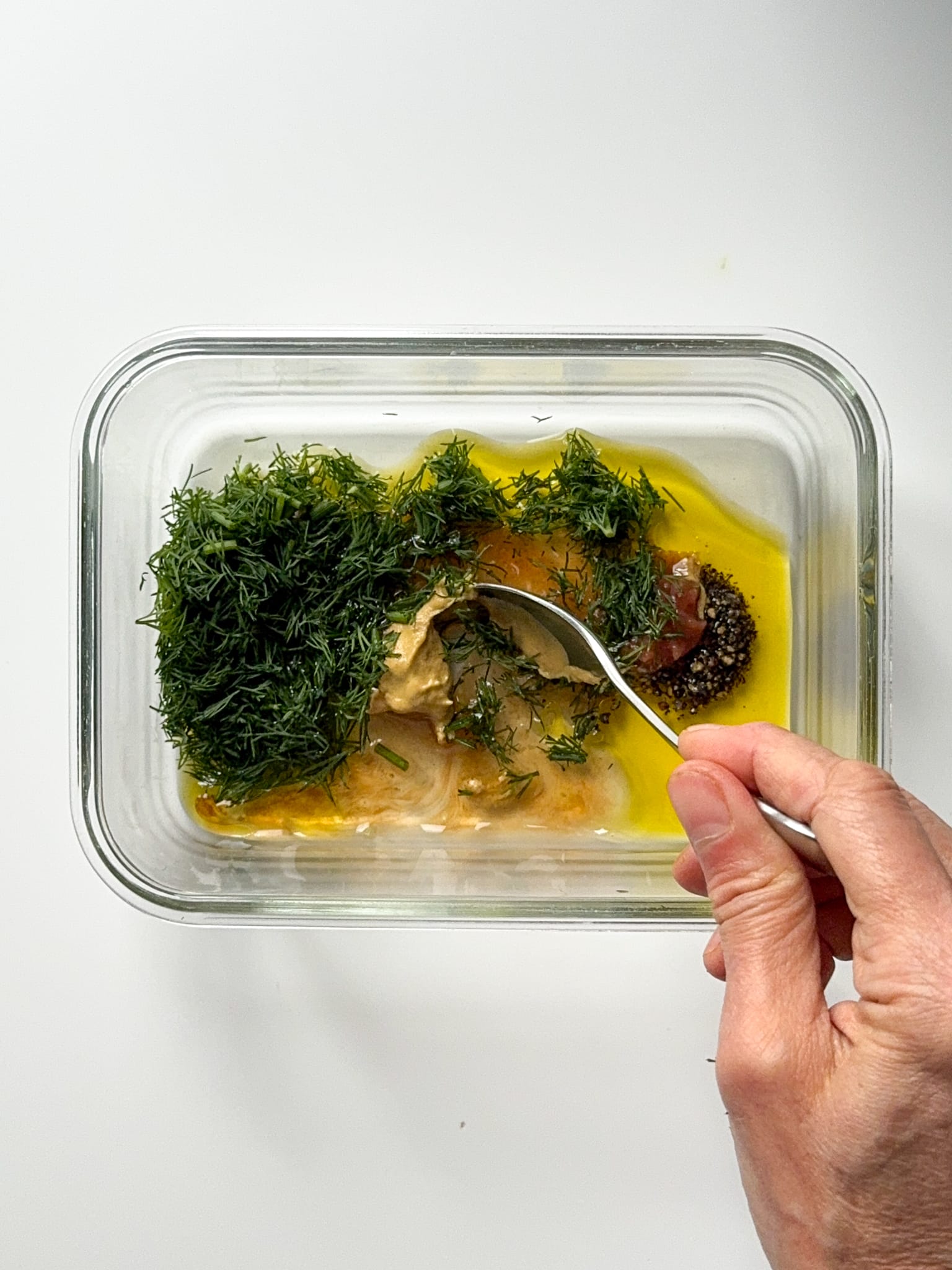 Smoked Carrot Lox marinate on a glass container