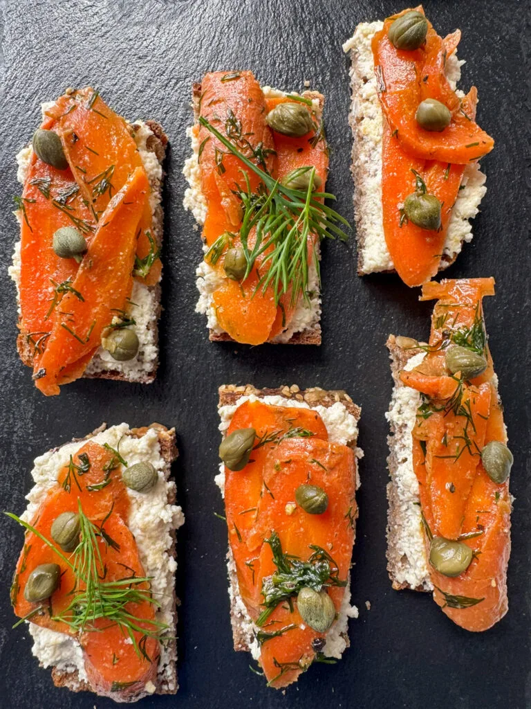 Smoked Carrot Lox on a black stone plate
