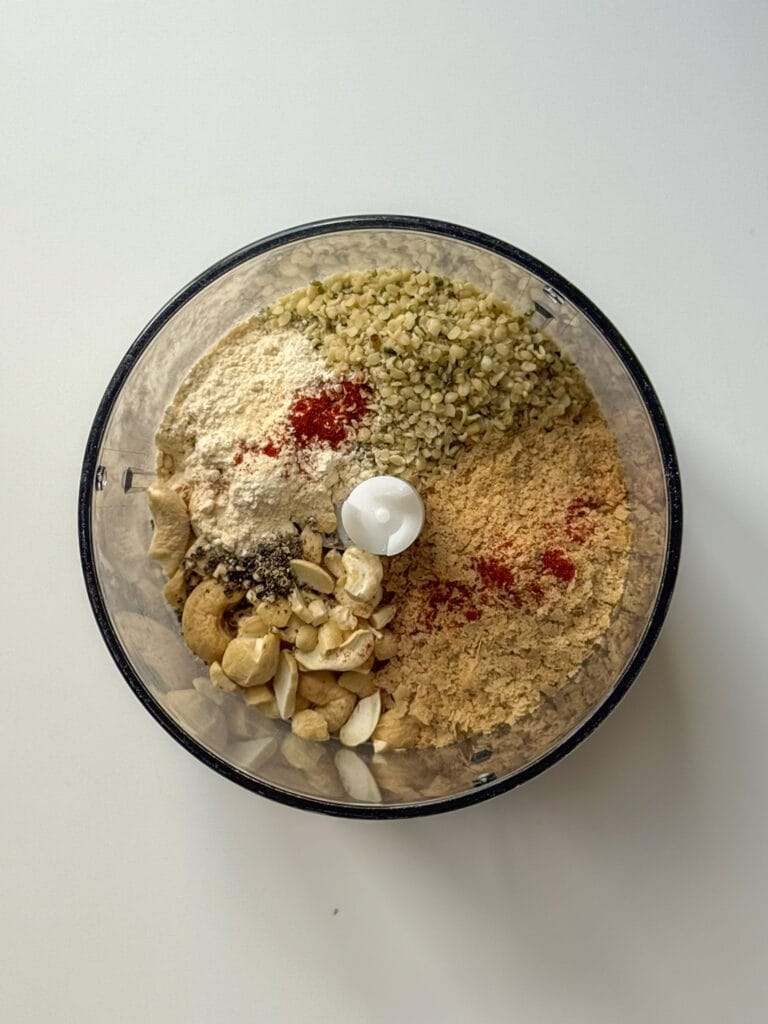 Easy Vegan Parmesan Sprinkle inside a blender cup